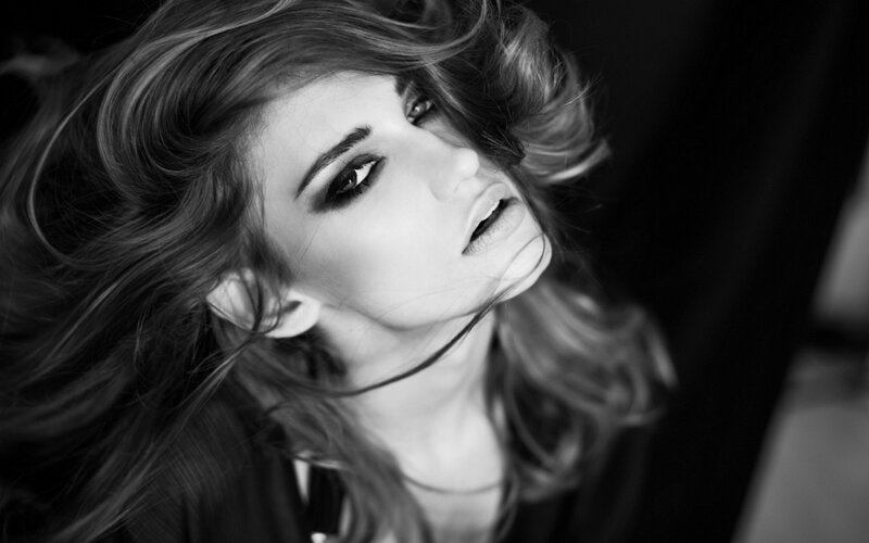 woman with dramatic makeup and hair