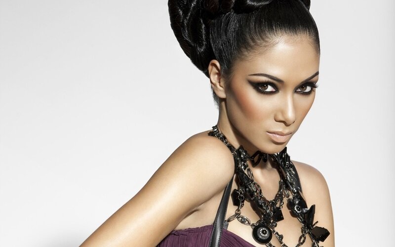 woman with dramatic makeup and hairstyle