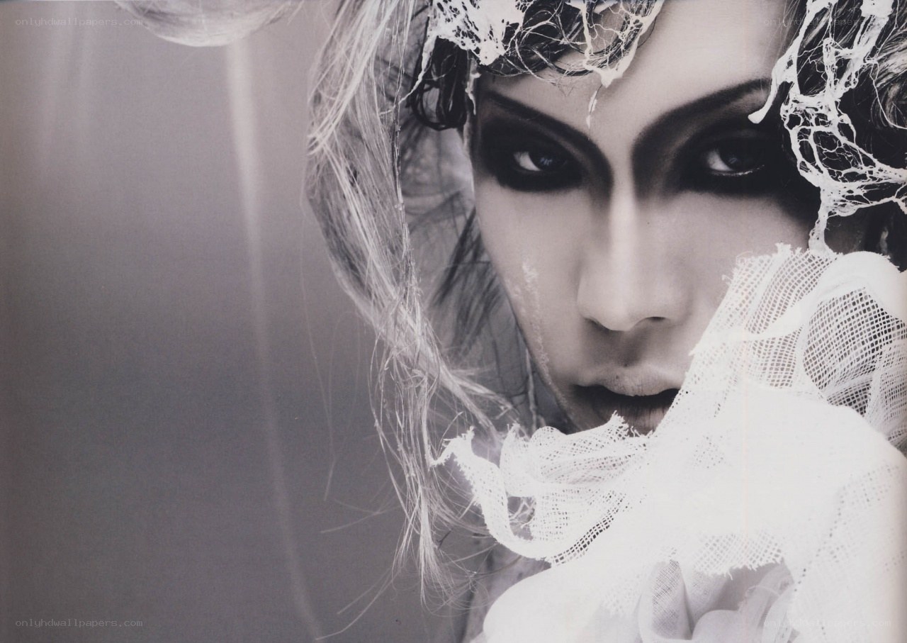 woman with dramatic makeup and lace