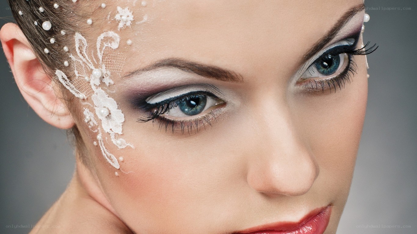 woman with dramatic makeup and lace