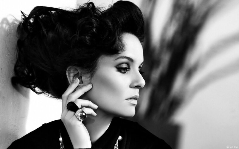 woman with dramatic makeup and ring