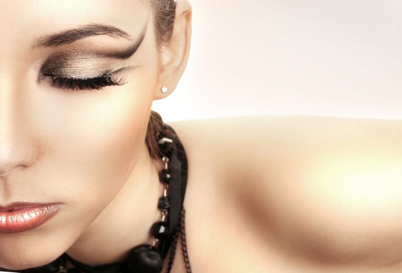 Woman with Dramatic Makeup — Brown, Photograph, Earring