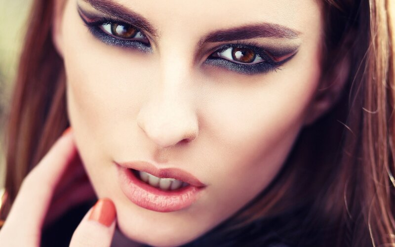 Woman with Dramatic Makeup — Brown, Photograph, Eyes, Hand