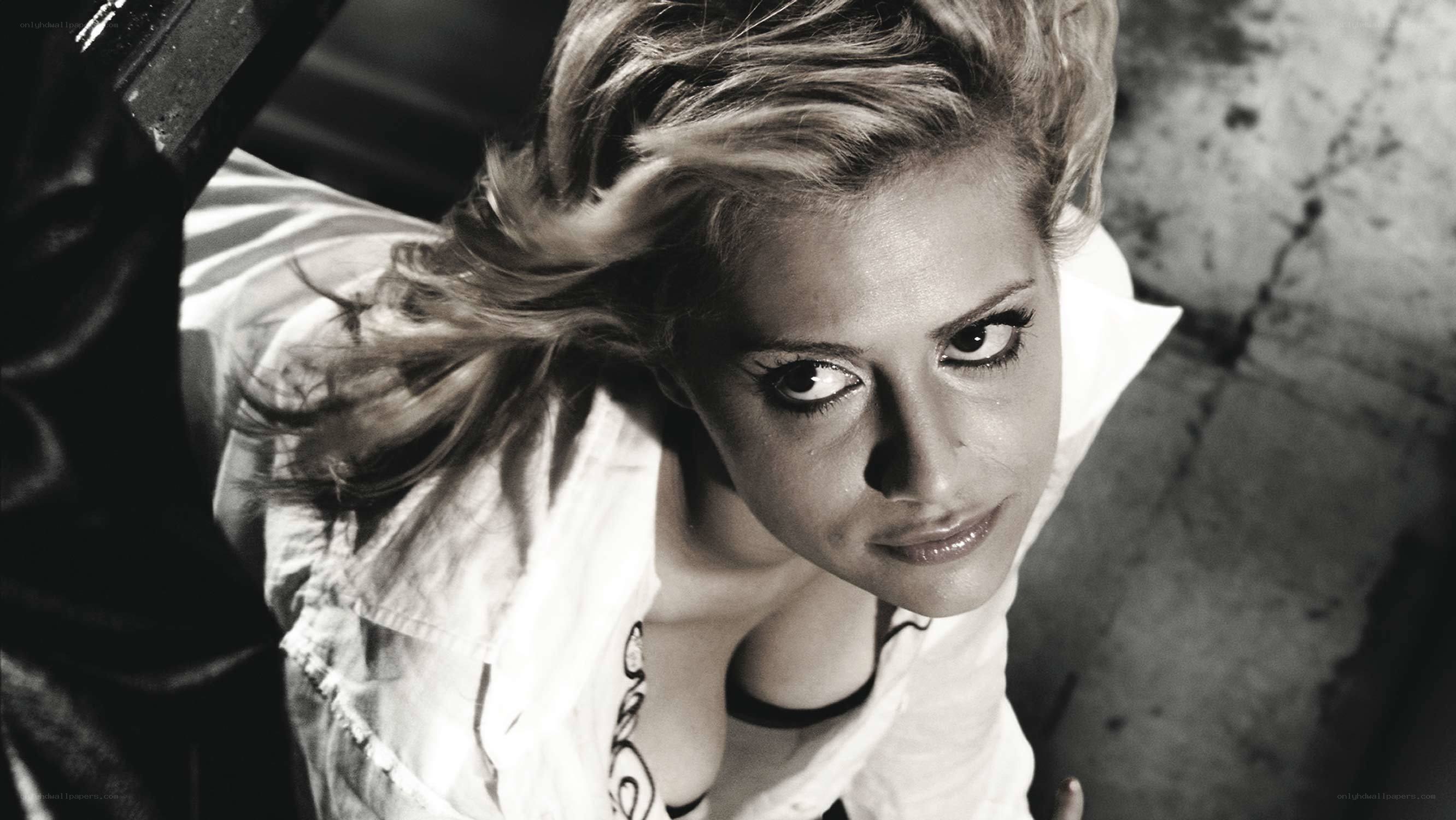 woman with dramatic makeup looking up