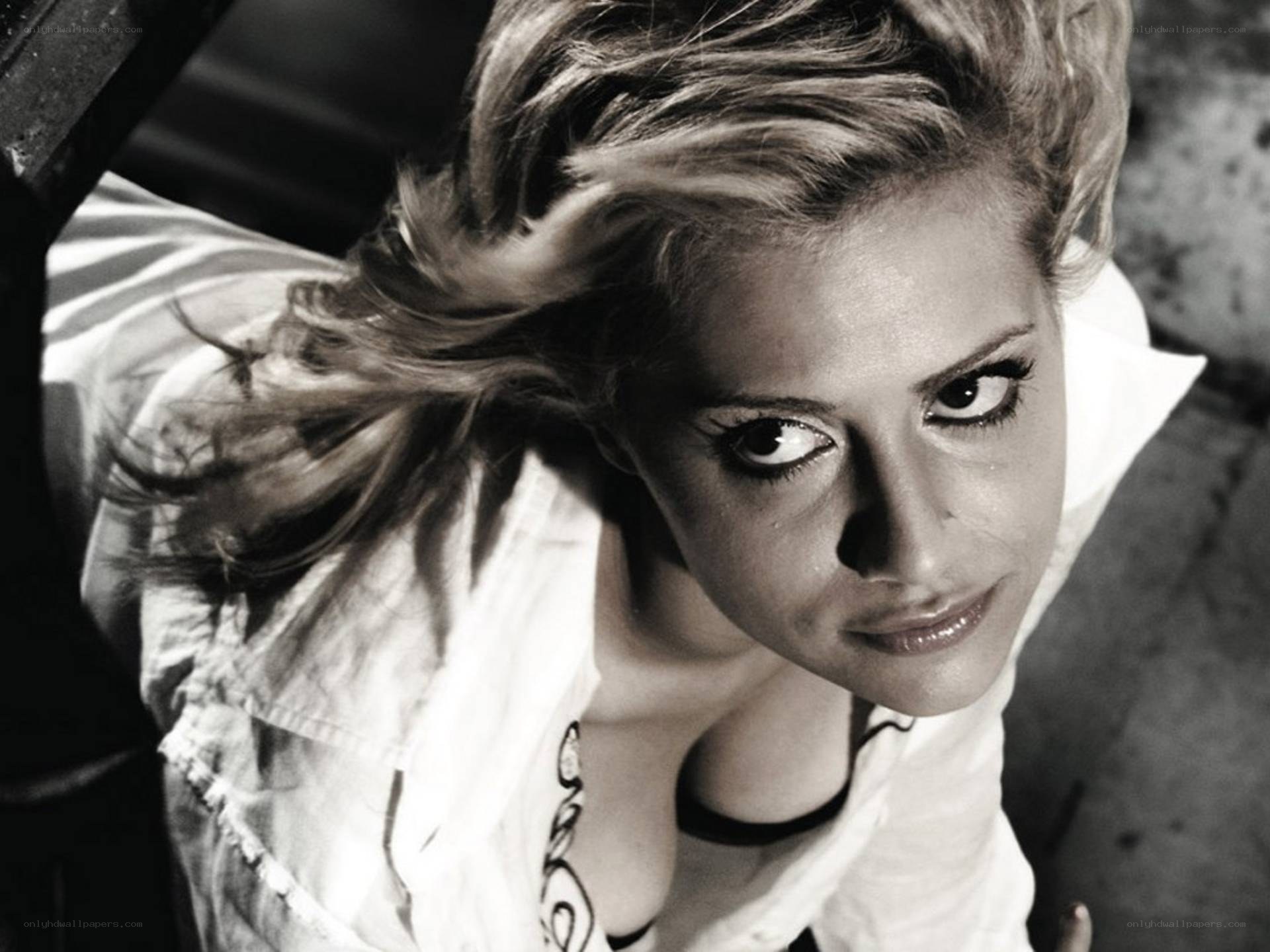 woman with dramatic makeup looking up