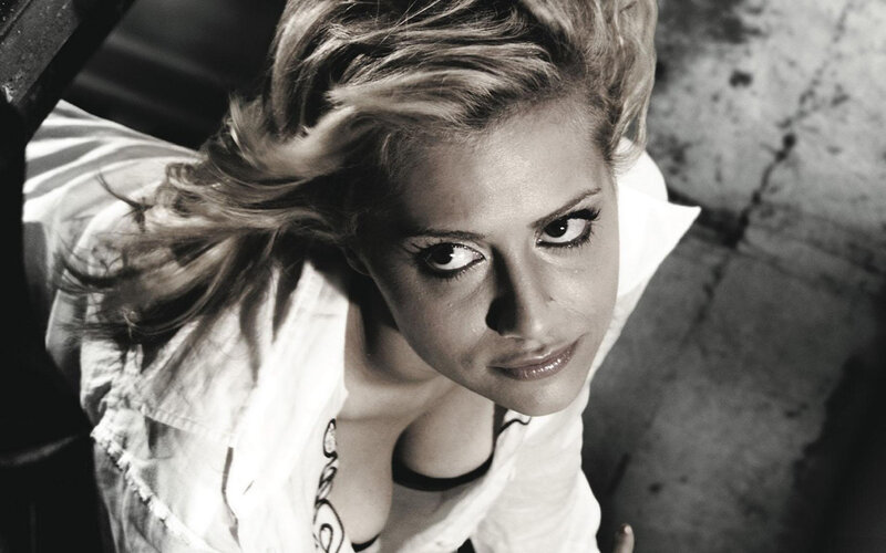 woman with dramatic makeup looking up