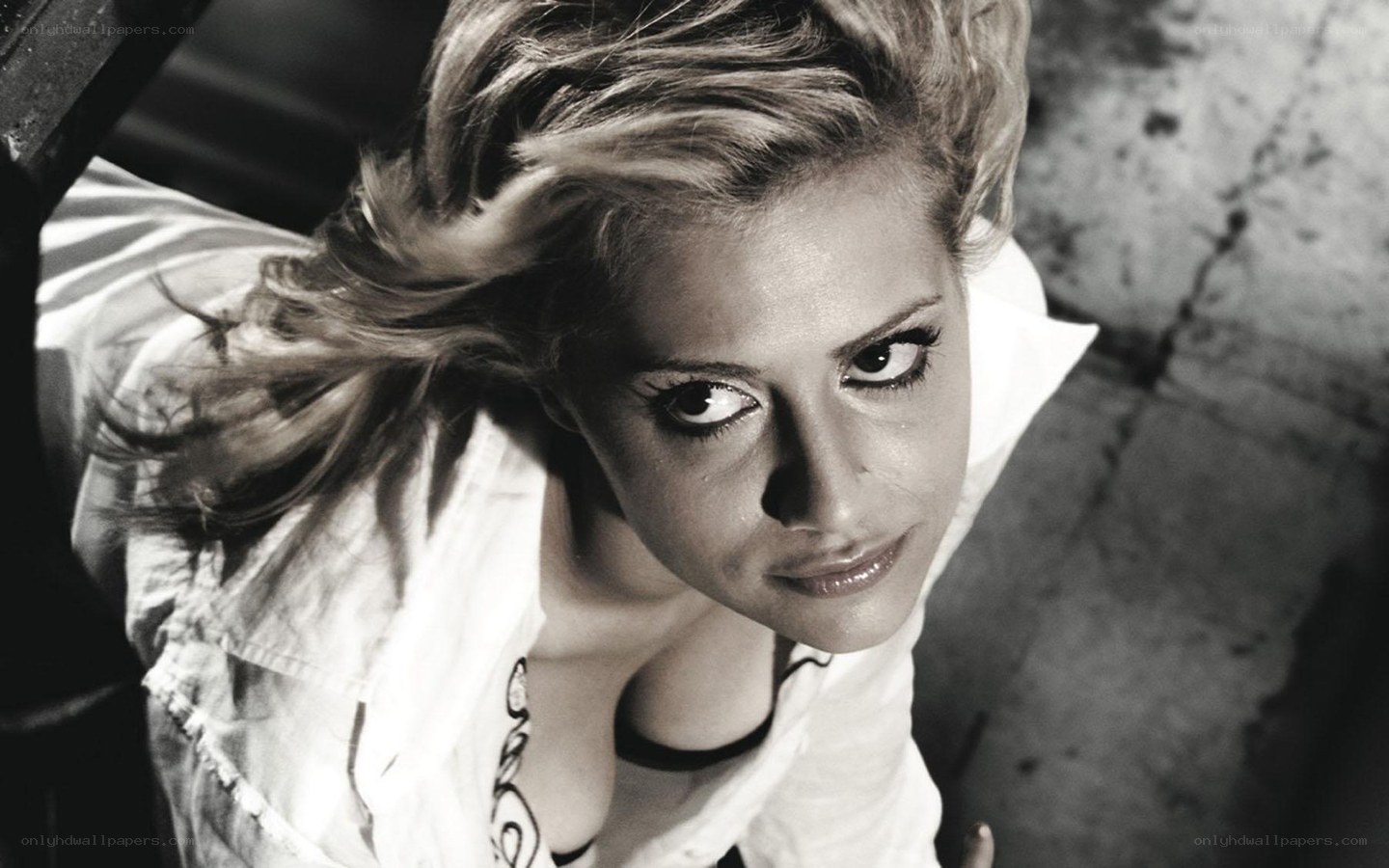 woman with dramatic makeup looking up