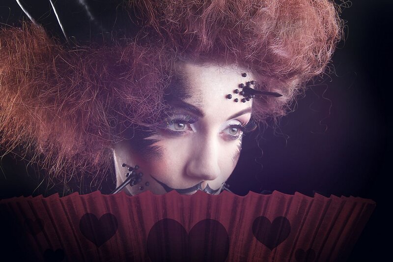 Woman with Dramatic Makeup — Red, Photograph, Fan