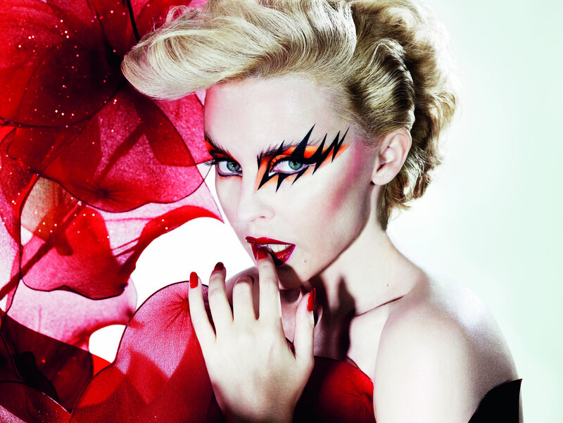 Woman with Dramatic Makeup — Red, Photograph, Red Fabric
