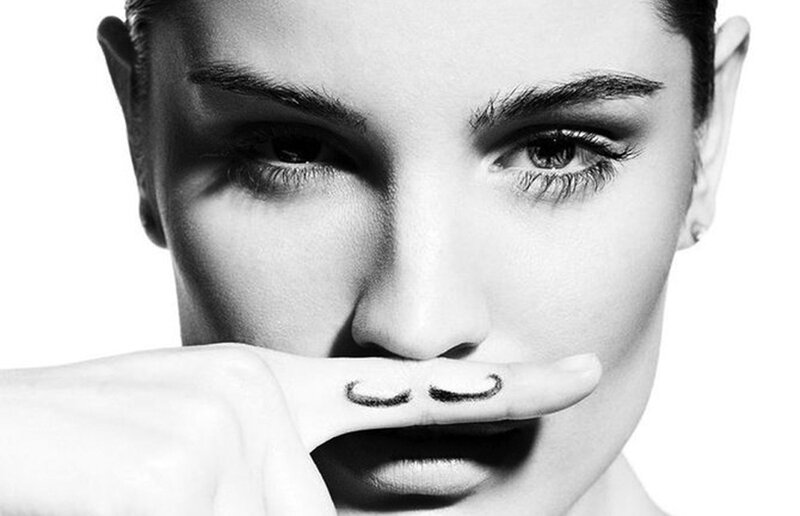 Woman with Drawn Mustache