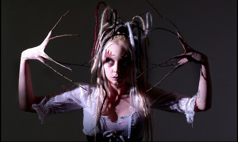 Woman with Dreadlocks and Branches