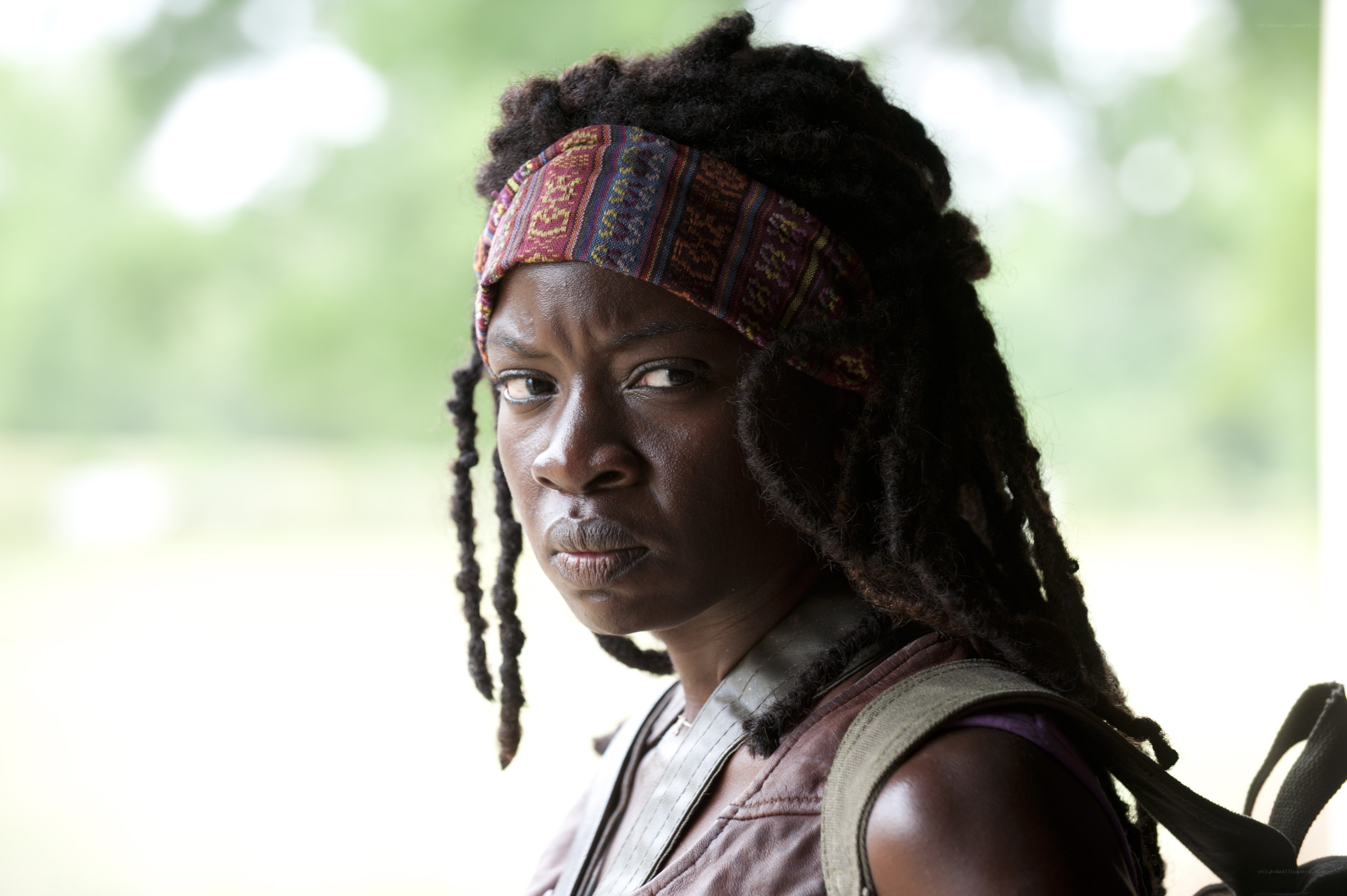 Woman with dreadlocks and headband