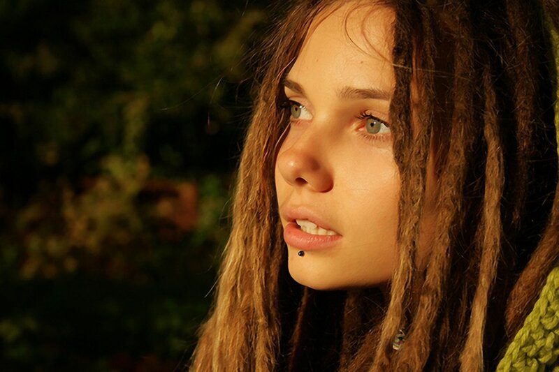 Woman with Dreadlocks — Brown, Contemplative