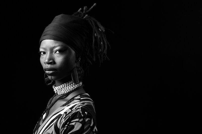 woman with dreadlocks in black and white
