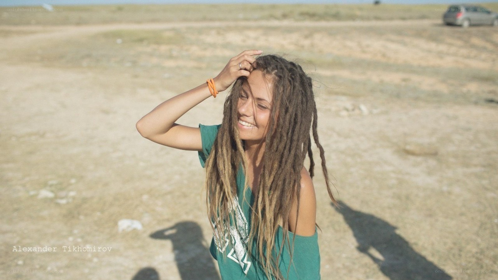 woman with dreadlocks in desert