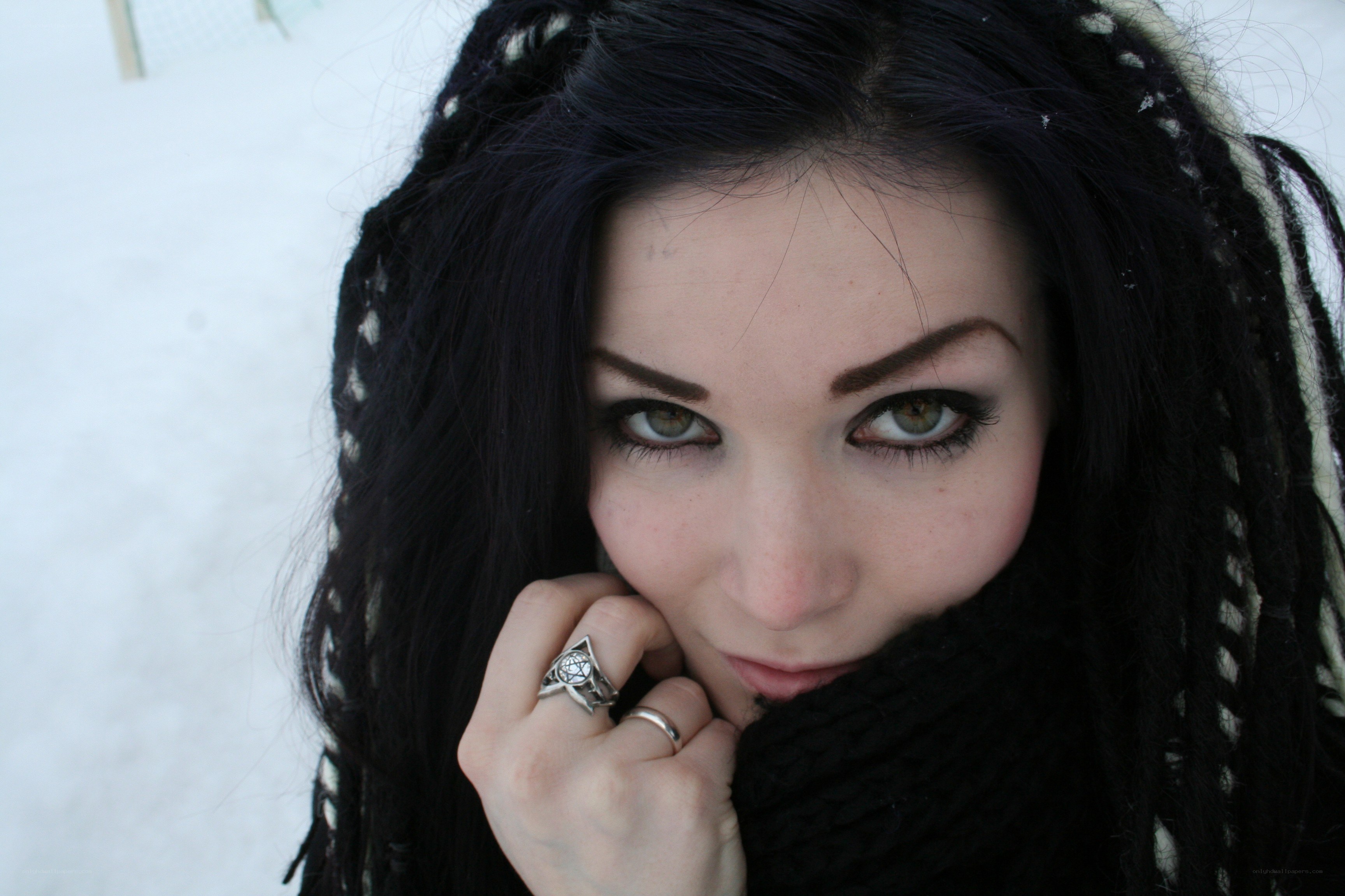 woman with dreadlocks in snow