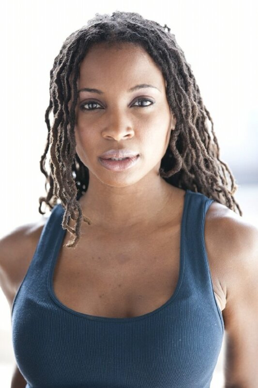 woman with dreadlocks in tank top