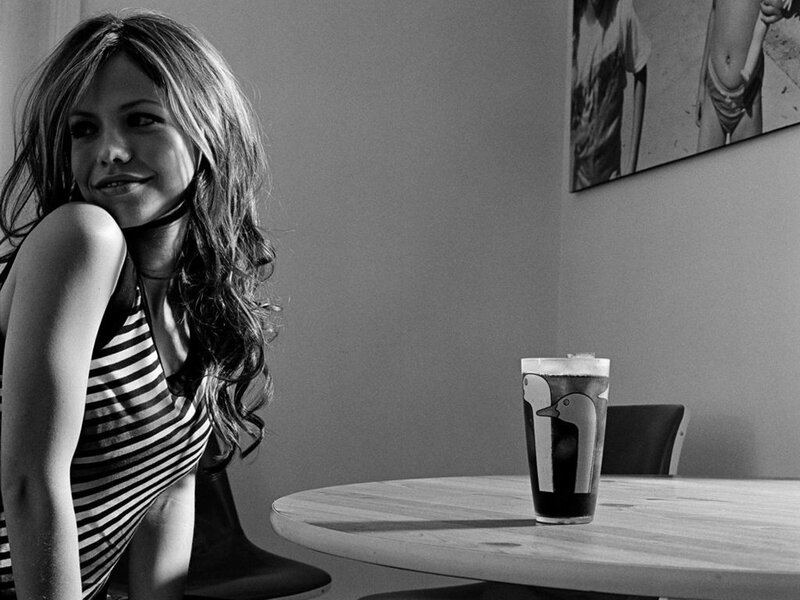 woman with drink at table