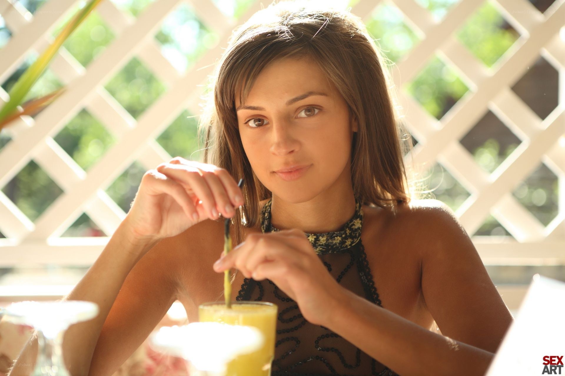 woman with drink at table