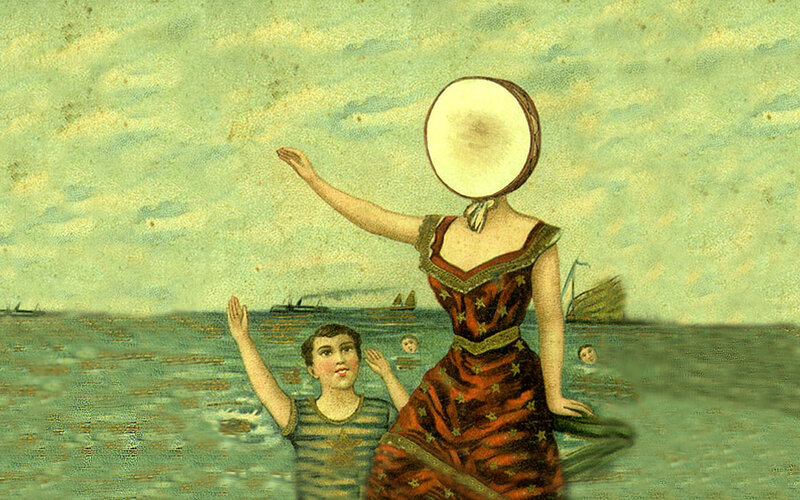 woman with drum head in water