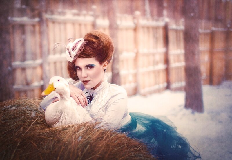 Woman with Duck in Snow