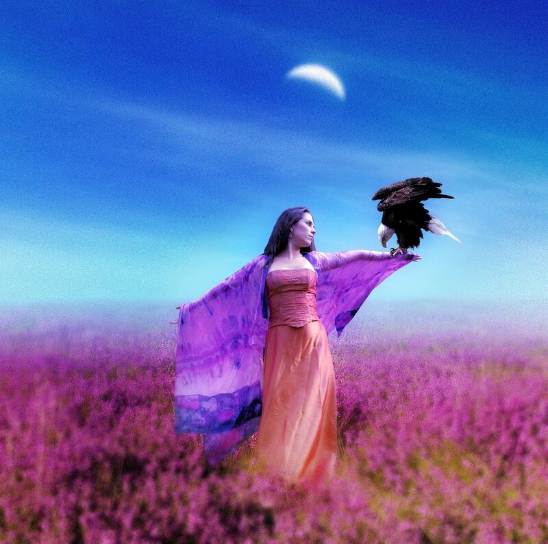 Woman with Eagle in Field