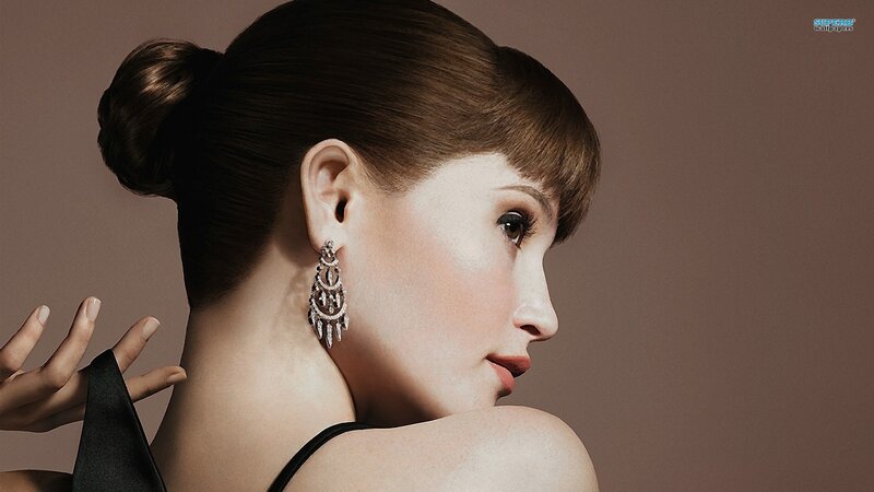 Woman with Earrings — Brown, Dramatic, Photograph, Hair Bun