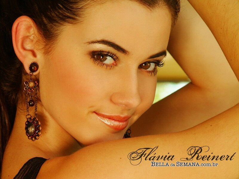 woman with earrings smiling