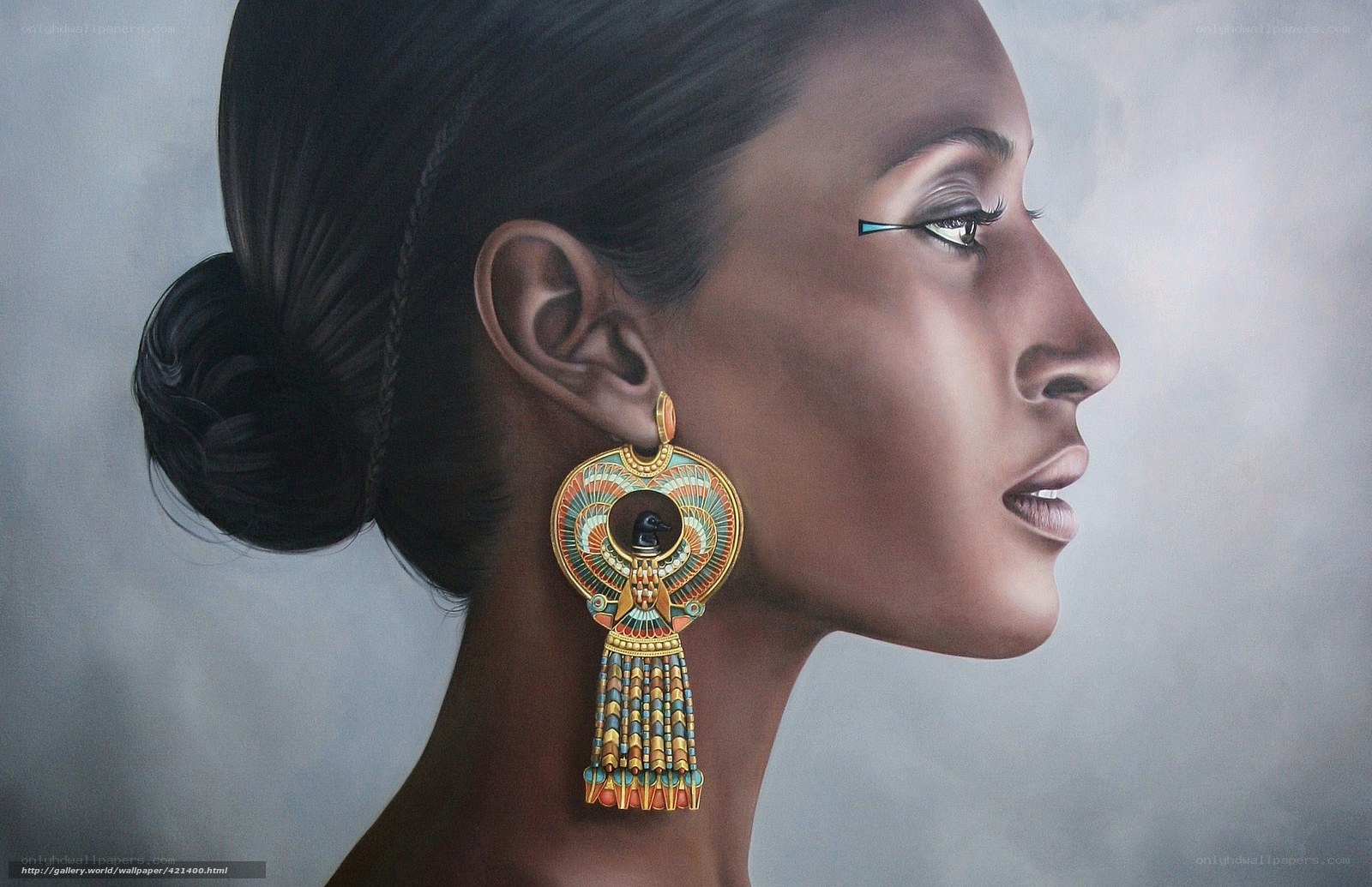 woman with egyptian earring