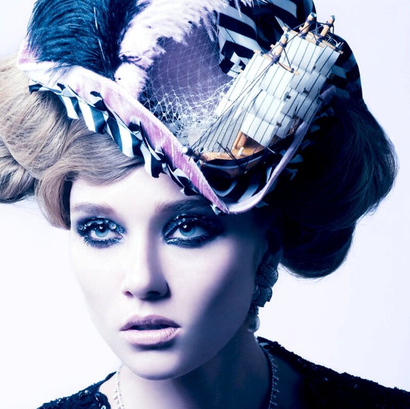 Woman with Elaborate Hat — Blue