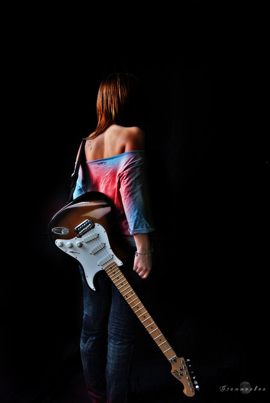 woman with electric guitar