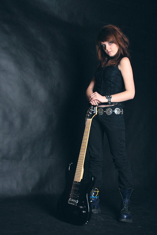 woman with electric guitar