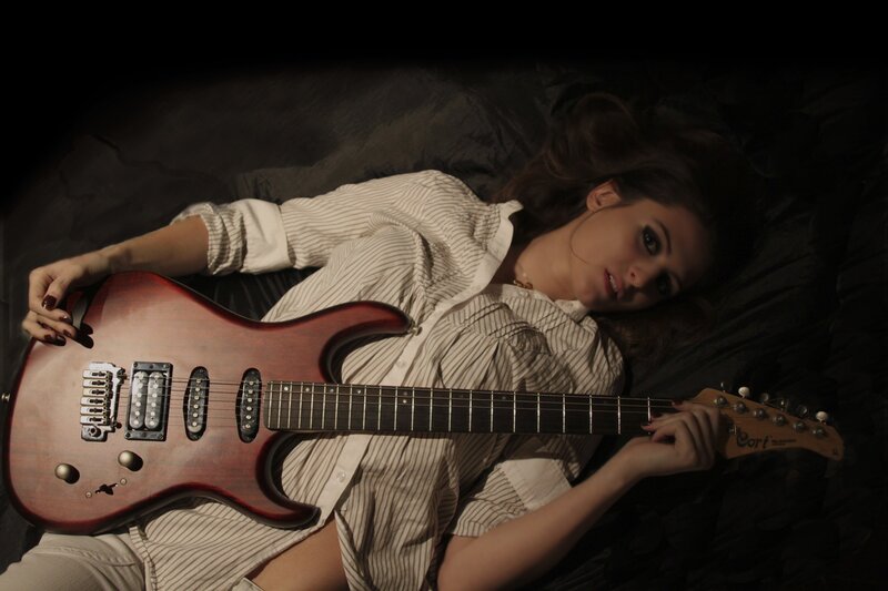 woman with electric guitar