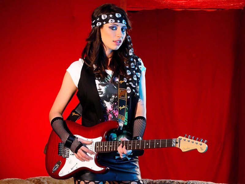 woman with electric guitar