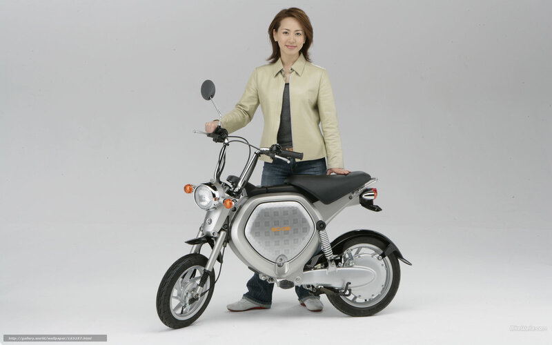 woman with electric scooter