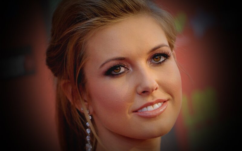 woman with elegant makeup and earrings