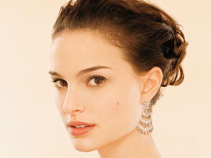 woman with elegant updo and earrings