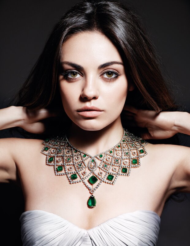 woman with emerald necklace
