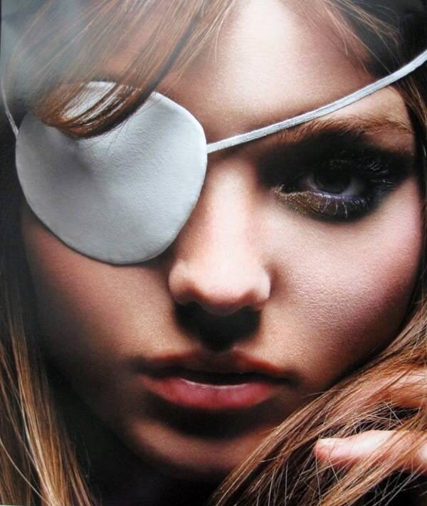 woman with eye patch