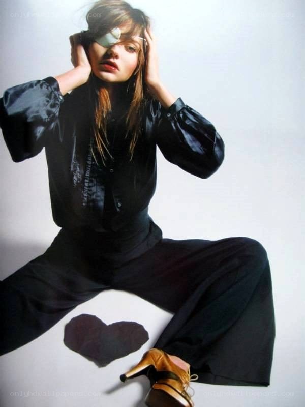 woman with eye patch and heart