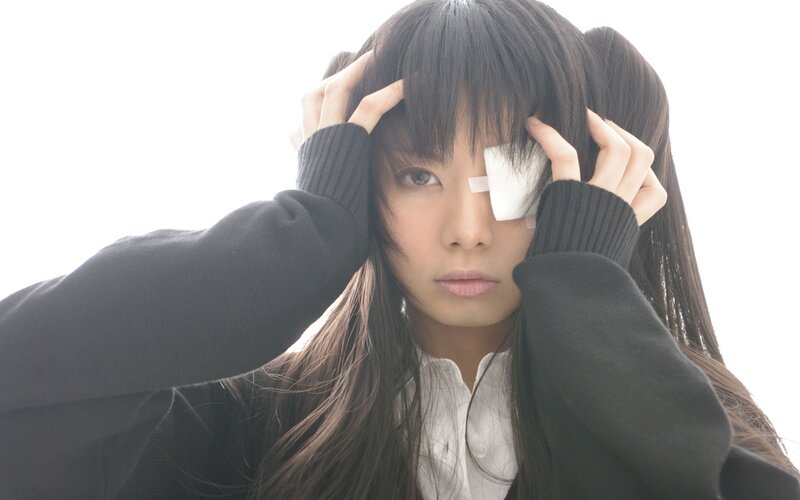 woman with eye patch