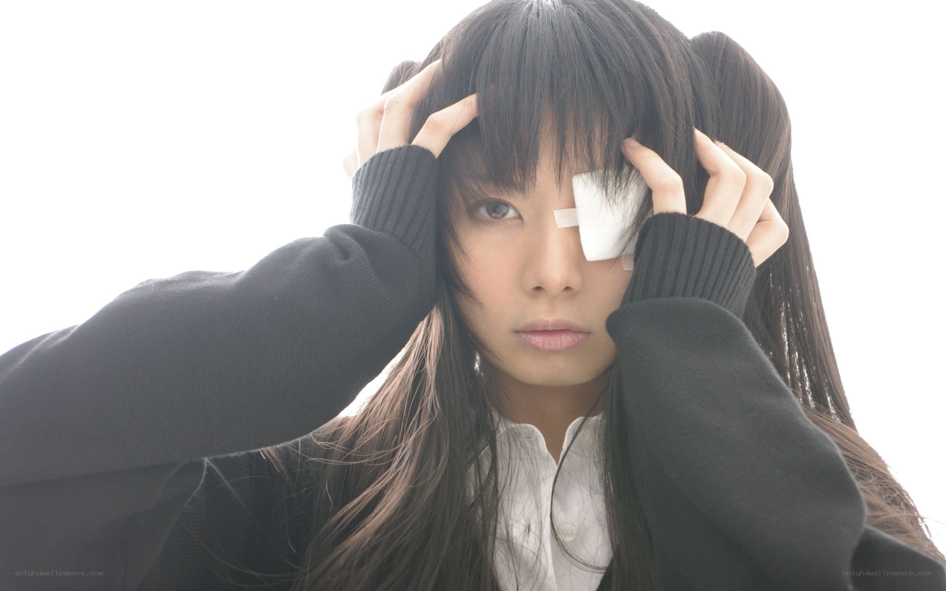 woman with eye patch