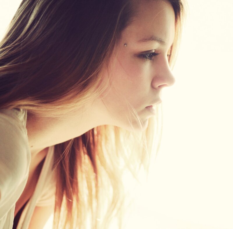 Woman with Eyebrow Piercing — White