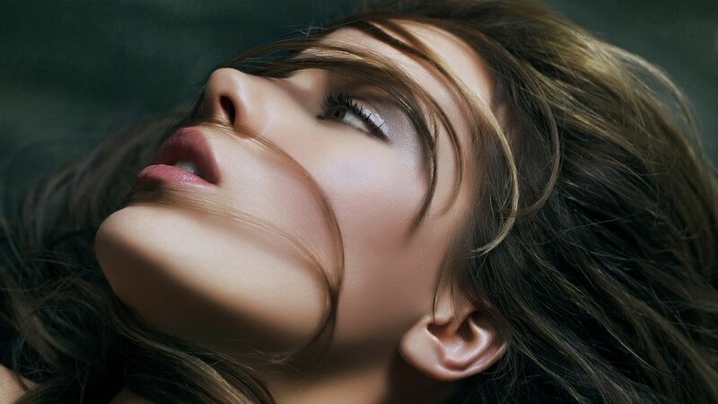 woman with eyes closed