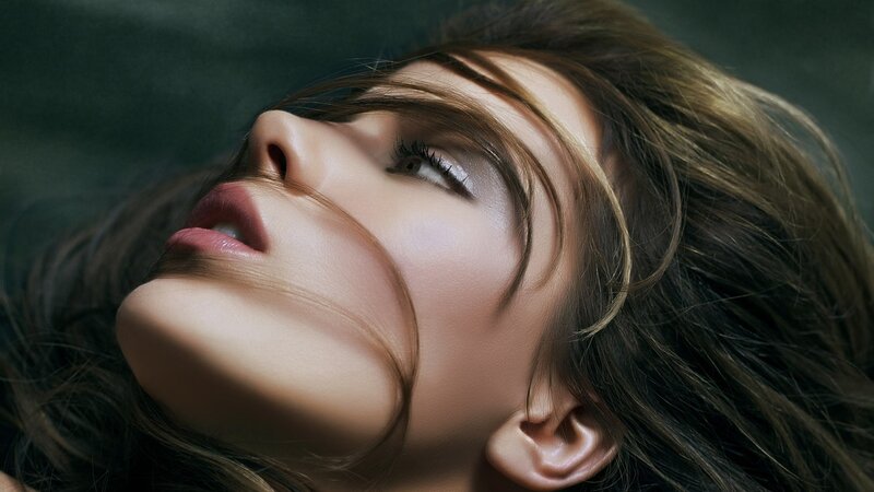 woman with eyes closed
