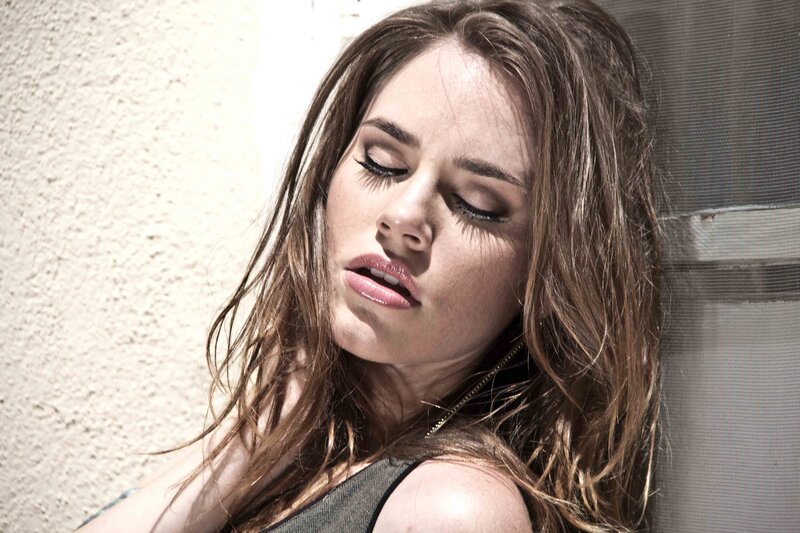 woman with eyes closed