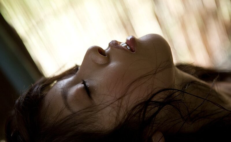 woman with eyes closed