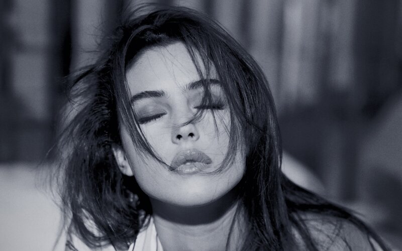 woman with eyes closed in wind