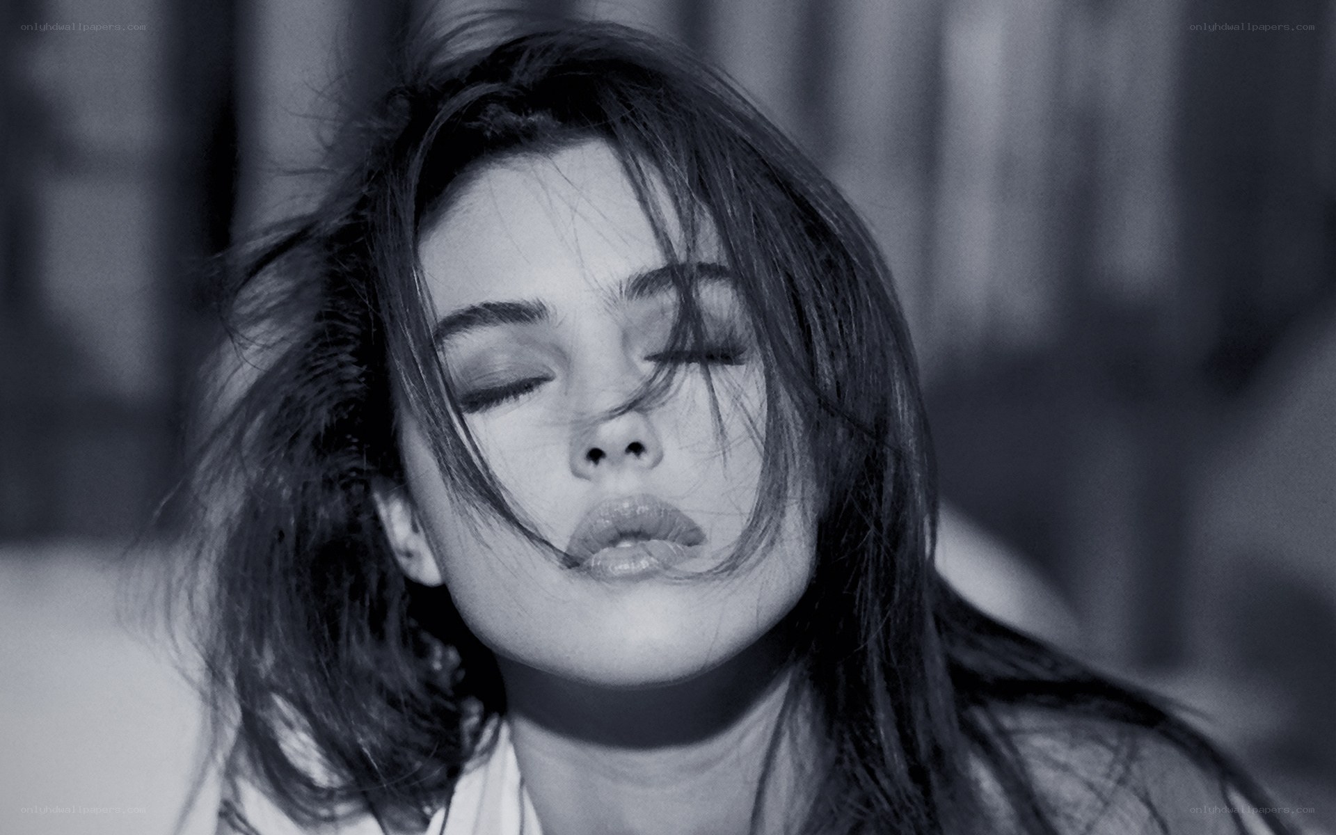 woman with eyes closed in wind