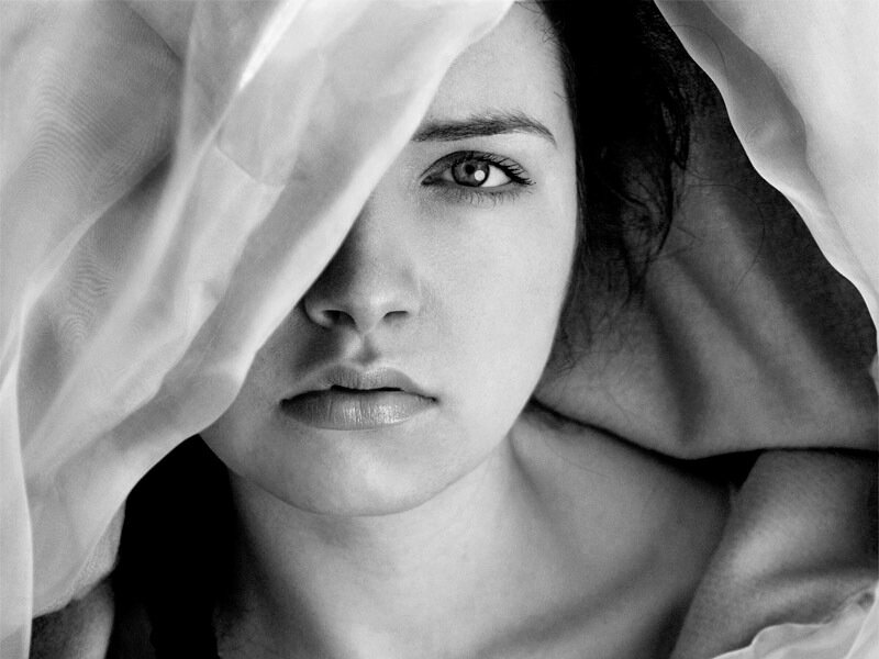 Woman with Fabric over Face